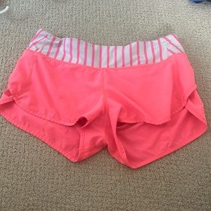 Pink and white lululemon shorts